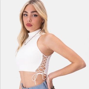 Adika size small white top, never worn